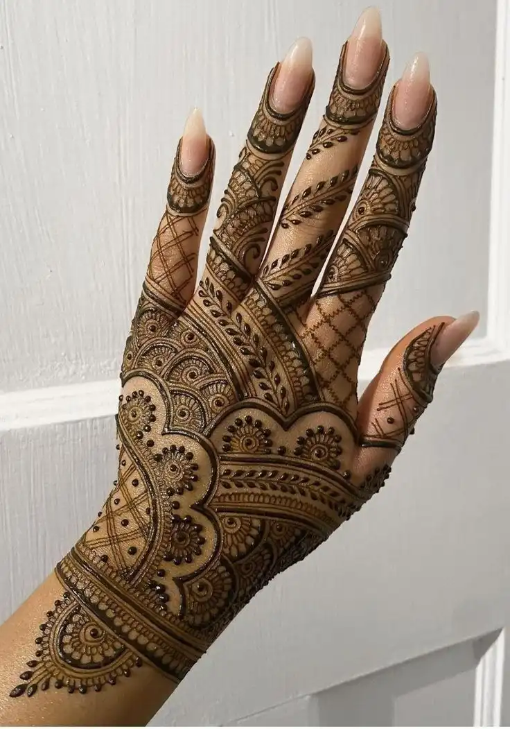 unique mehndi design back hand